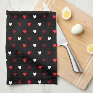 Red and white hearts on black tea towel