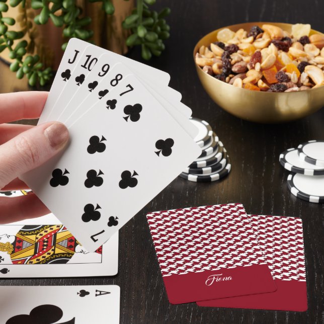 Red and white houndstooth pattern monogram playing cards (In Situ)