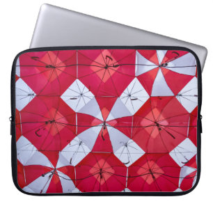 Red and White Open Umbrellas Laptop Sleeve