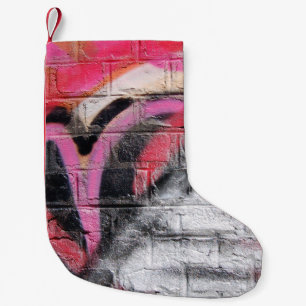 Red and white painted wall small christmas stocking