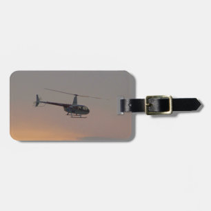 Red and white R44 at sunset. Luggage Tag