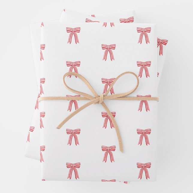 Red and White Satin Bows Red Candy Cane Stripe Bow Wrapping Paper Sheet (In situ)