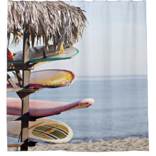 Red and white surfboard in brown wooden rack shower curtain