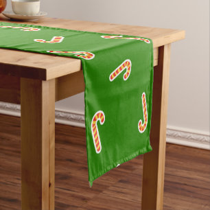 Red and yellow candy canes green short table runner