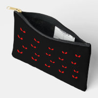 Red angry eyes in the dark
