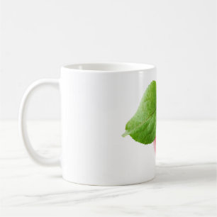 Red apple from above coffee mug