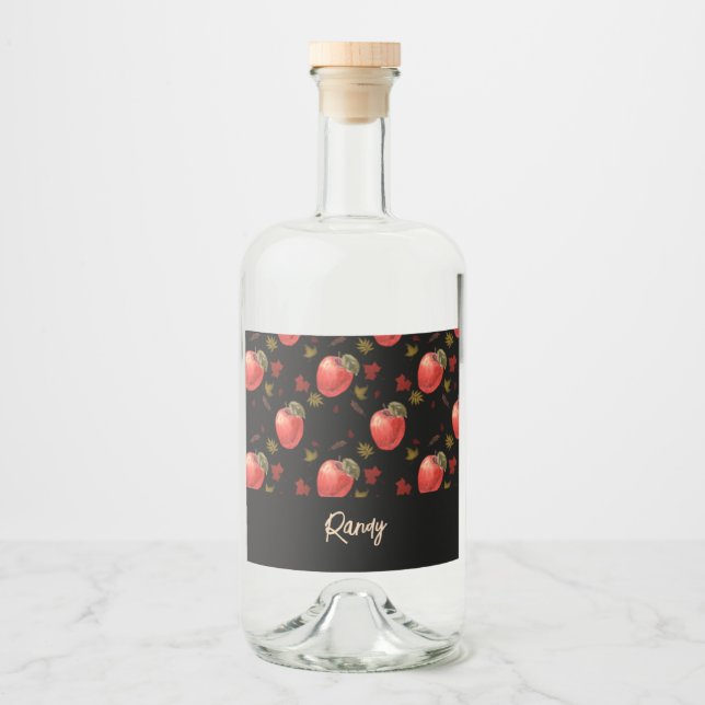 Red apples and leaves on black liquor bottle label (Front)