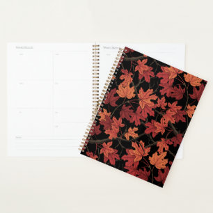 Red Autumn maple leaves on black Planner