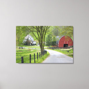 Red barn and farm house near Berlin, Ohio. Canvas Print