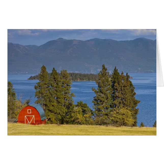 Red barn sits along scenic Flathead Lake near (Front Horizontal)