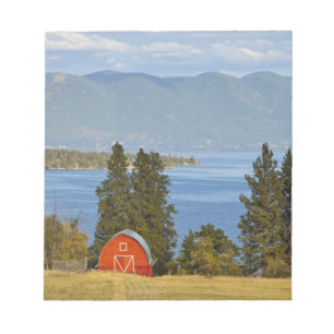 Red barn sits along scenic Flathead Lake near Notepad