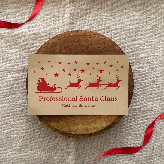 Red Beige Santa Sleigh Professional Santa Service Business Card (Promote your Professional Santa Claus services with the help of this festive business card design.)