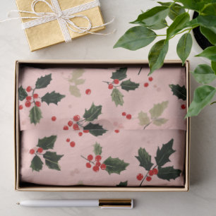 Red berries and holly on pink tissue paper