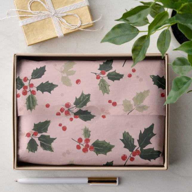 Red berries and holly on pink tissue paper (Gift)