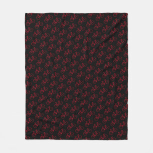 Red Bicycles on Black Blanket for a Cyclist