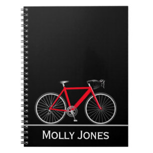 Red Bike with Name on Black Notebook
