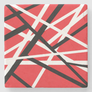 red, black, and white graphic stone coaster