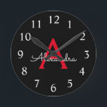 Red Black Script Girly Monogram Name Round Clock<br><div class="desc">Red and Black Simple Script Monogram Name Clock. This makes the perfect sweet 16 birthday,  wedding,  bridal shower,  anniversary,  baby shower or bachelorette party gift for someone that loves glam luxury and chic styles.</div>