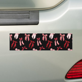 Red bows in black bumper sticker
