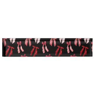 Red bows in black nameplate