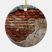 Red Brick Under Graffiti Laced Cement Wall