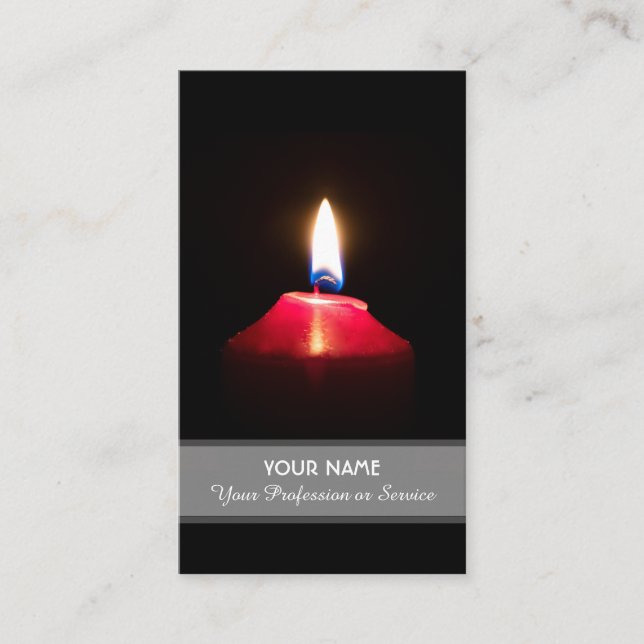 Red candle light illuminates the dark business card (Front)
