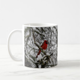Red Cardinal in a Snow Filled Tree Coffee Mug
