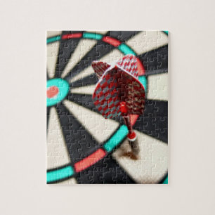 Red chequered dart on dartboard jigsaw puzzle