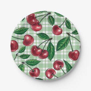 Red cherries on light green gingham paper plate