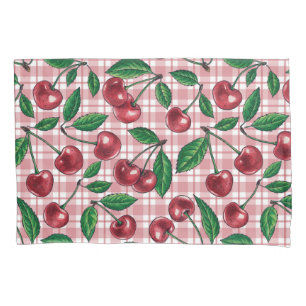 Red cherries on pink gingham pillowcase