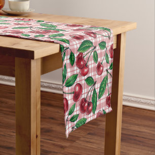 Red cherries on pink gingham short table runner