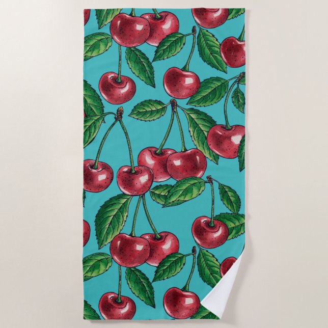 Red cherries on turquoise beach towel (Front)