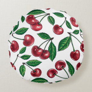 Red cherries on white round cushion