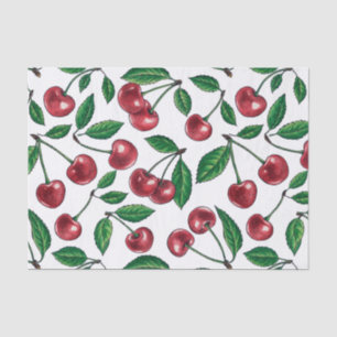 Red cherries on white tissue paper