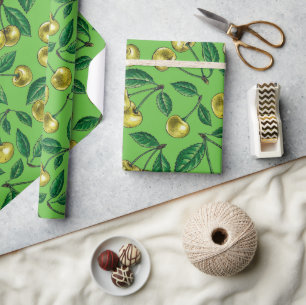 Red cherries on white wrapping paper