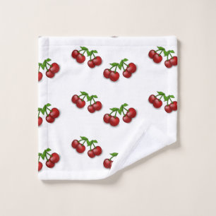 Red cherry fruit on white wash cloth