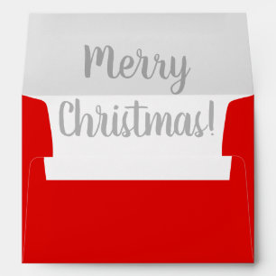 Red Christmas envelopes with handlettered liner