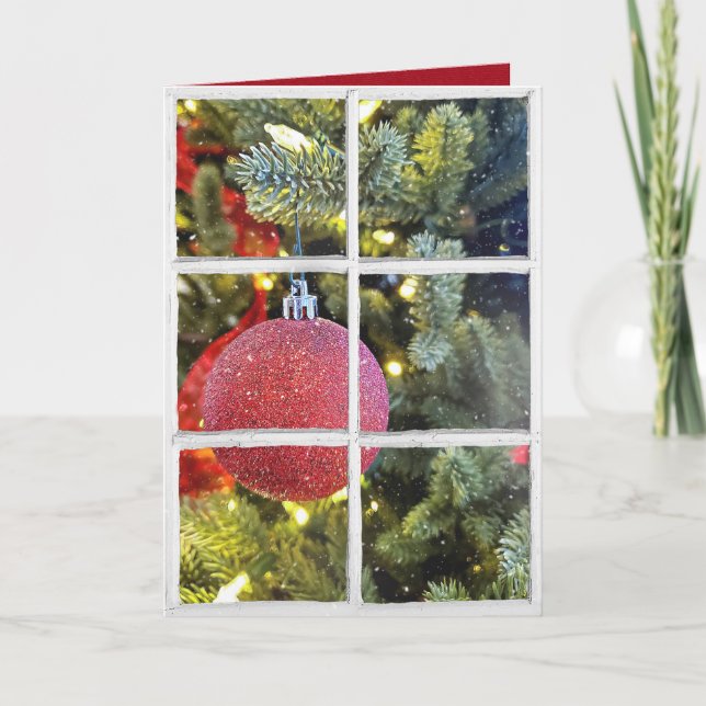 red Christmas ornament in snowy window Holiday Card (Front)