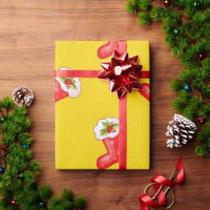 Red Christmas Stockings on Yellow Wrapping Paper