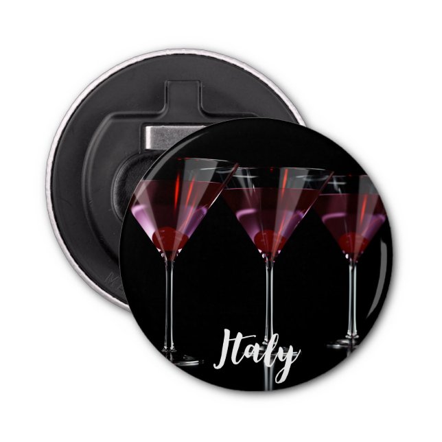 Red cocktails in martini glass with cherry bottle opener (Front)