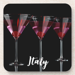 Red cocktails in martini glass with cherry coaster