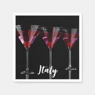 Red cocktails in martini glass with cherry napkin