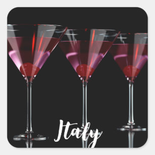 Red cocktails in martini glass with cherry square sticker