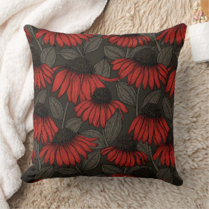 Red coneflowers on brown cushion