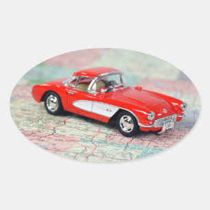 Red Corvette on Road Map Oval Sticker