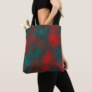 Red crisscrossing scratches over charred cyan tote bag