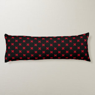 Red cross stitches on black body cushion