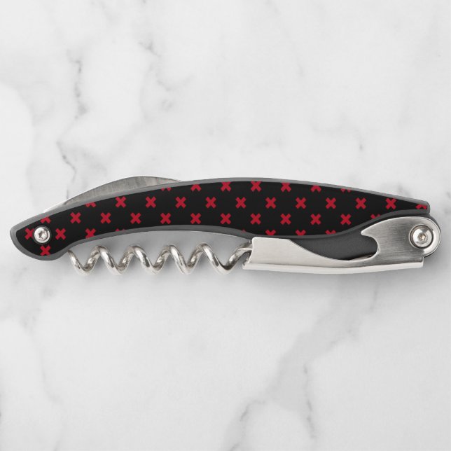 Red cross stitches on black corkscrew (Back)