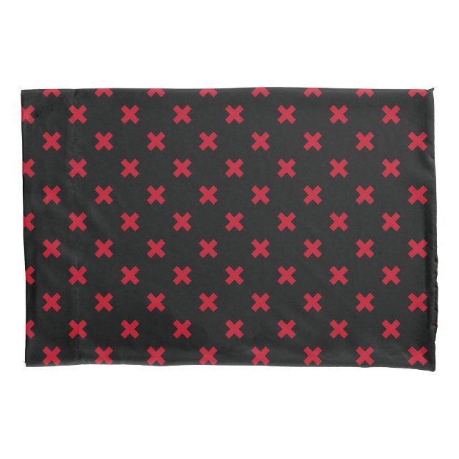 Red cross stitches on black pillowcase (Front)