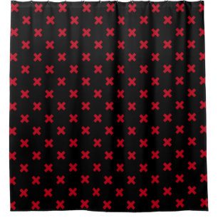 Red cross stitches on black shower curtain